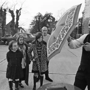 The Brolley Challenger - Jim Carver, of Orpington, taking an umbrella out of a case The Brolley Challenger - Jim Carver, of Orpington, taking an umbrella out of a case