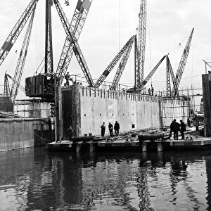Bromborough, Wirral, Merseyside. A reinforced concrete dry dock launched at Bromborough