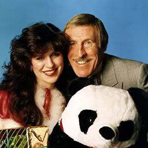 Bruce Forsyth, TV Personality. Pictured with Rosemary Ford and a cuddly toy