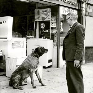 Bruce the shop dog is passed on to a new owner as Arthur Turner retires from