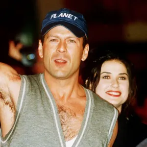 Bruce Willis and Demi Moore at Planet Hollywood London Print (May 1993)