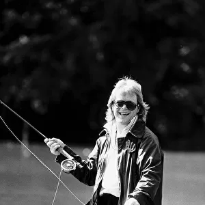 Bruno Brookes Disc Jockey practices his fly fishing in one of the ponds near his home in