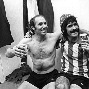 Bryan Robson (left) & Billy Hughes Sunderland football players celebrate in changing room