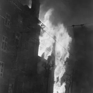 A building in Grays Inn Road, London on fore after a night of bombing in the blitz during
