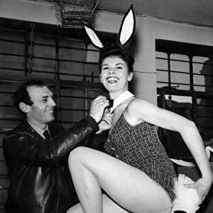 Bunny Girl having her bow-tie straightened. February 1963 P018504