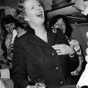 Buoyant. Mrs. Thatcher on polling day eve with the Party faithful. June 1983 P009158