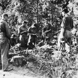 Burial of British soldier killed by Japanese sniper in a service held by Fr. H. E. Ralph Burial of British soldier killed by Japanese sniper in a service held by Fr. H. E. Ralph