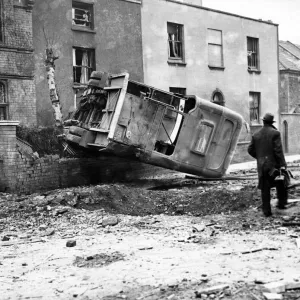 Bus hit by a bomb in Bristol. March 1941