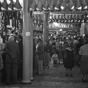 A busy Italian butchers shop, Parma, Italy Circa 1955 A busy Italian butchers shop, Parma, Italy Circa 1955