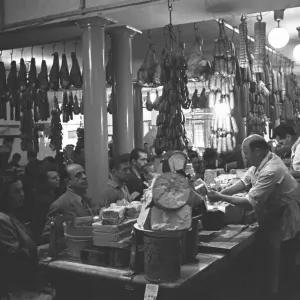 A Busy Italian Delicatessen Shop Print, Parma, 1955 A Busy Italian Delicatessen Shop Print, Parma, 1955