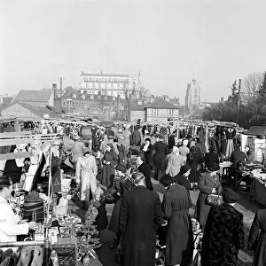 Busy scene showing shoppers and traders at Chelmsford Market in Essex. 28th November 1952