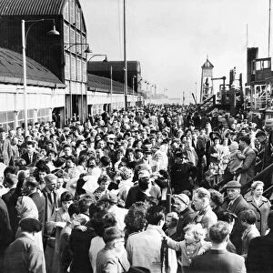 Busy scenes at Liverpool Landing stage as passengers queue for the ferries to New