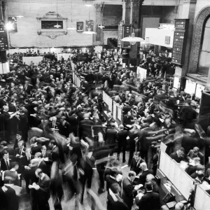 Busy scenes showing crowds of traders in a hurry at the London Stock Exchange shorlty