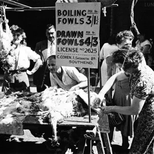 A butchers stall at a market in Whitechapel, East London. Circa 1947 A butchers stall at a market in Whitechapel, East London. Circa 1947