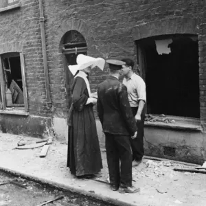 Buxton & Underwood Street, E1. Flying bomb incident in Southern England showing