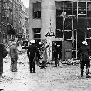 Buzz bomb raid on Berkeley Square, London. A buzz-bomb fell on a large building