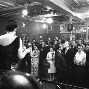 Cabaret singer performing in a East End of London pub on a Saturday night. 6th July 1963 Cabaret singer performing in a East End of London pub on a Saturday night. 6th July 1963