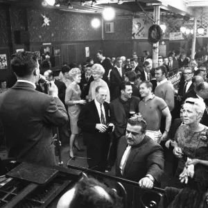Cabaret singer performing in a East End of London pub on a Saturday night. 6th July 1963 Cabaret singer performing in a East End of London pub on a Saturday night. 6th July 1963