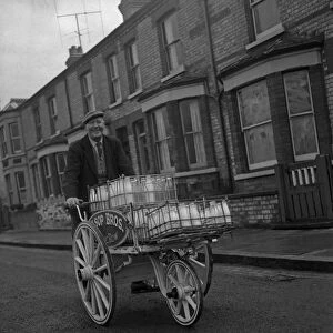 Cambridge milkman on his round with his milk cart, Circa 1969