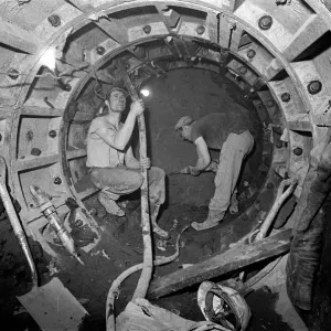 Print of workers in a Coventry tunnel, 1970 Print of workers in a Coventry tunnel, 1970