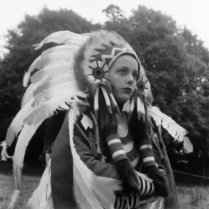 Carol Gray dressed as a Indian takes part in the Cal McAndrew rodeo show