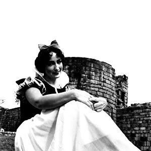 Carol Leroy on a photoshoot on the Newcastle City Walls for the Pantomime Snow White