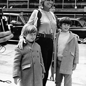 Carol White arrining at Heathrow airport with her sons May 1970 Dbase MSI