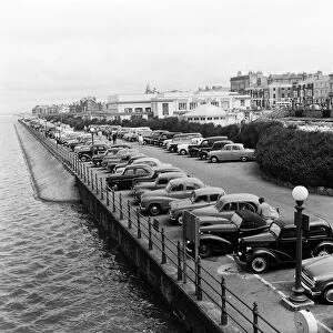 Cars parked along the sea front at Southport, Merseyside. 5th August 1959