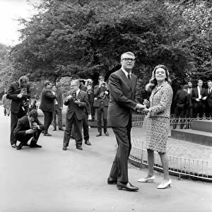 Cary Grant and his not-so-new bride Dyan made a happy picture in London when they faced