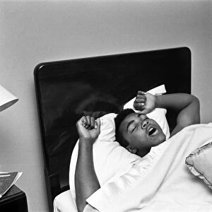 Cassius Clay aka (Muhammad Ali) catches up on some sleep in the Piccadilly Hotel