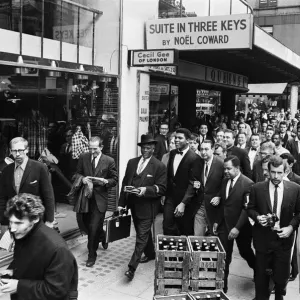 Cassius Clay (centre) and entourage on route to his press conference for his upcoming Cassius Clay (centre) and entourage on route to his press conference for his upcoming