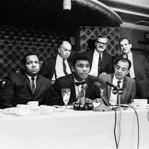 Cassius Clay (centre) holding a press conference prior to his rematch with Henry Cooper Cassius Clay (centre) holding a press conference prior to his rematch with Henry Cooper