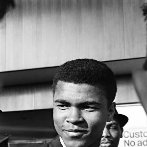 Cassius Clay later to become Muhammad Ali in England for his first clash with British