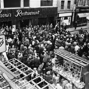 Cassius Clay leaves the crowded Soho restaurant back to his hotel. 19th May 1966 Cassius Clay leaves the crowded Soho restaurant back to his hotel. 19th May 1966