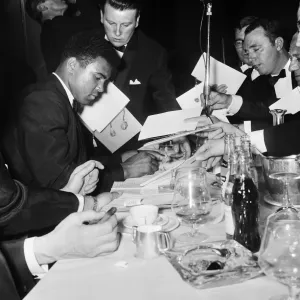 Cassius Clay (Muhammad Ali) attends a sports writers reception Cassius Clay (Muhammad Ali) attends a sports writers reception