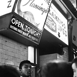 Cassius Clay (Muhammad Ali) outside the Flamingo Jazz Club in Wardour Street