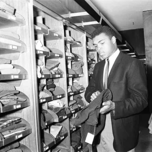 Cassius Clay (Muhammad Ali) seen here in Austin Reeds to buy a suit unfortunately they Cassius Clay (Muhammad Ali) seen here in Austin Reeds to buy a suit unfortunately they