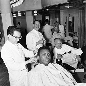 Cassius Clay (Muhammad Ali) seen here in the hairdressing salon of Austin Reeds in