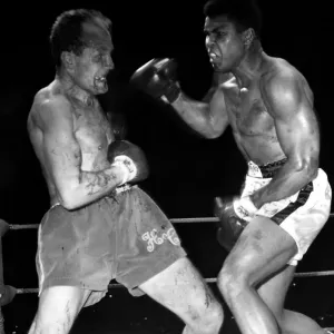 Cassius Clay ( Muhammad Ali ), World Heavyweight Champion and challenger Cassius Clay ( Muhammad Ali ), World Heavyweight Champion and challenger