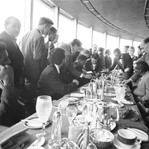 Cassius Clay seen here signing autographs whilst he was attending a lunch at the top of Cassius Clay seen here signing autographs whilst he was attending a lunch at the top of