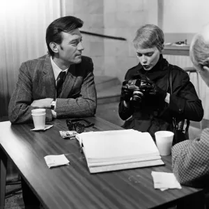 Cast and crew on the set of A Dandy in Aspic. The scene is representing a checkpoint in