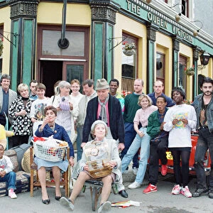 The cast of EastEnders on set. Picture includes Mike Reid, June Brown, John Altman