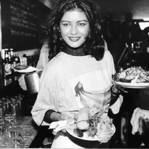 Catherine Zeta Jones Actress plays a waitress at the Cafe Casbar in aid of a charity