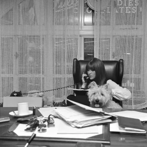 Cathy McGowan, English Television Personality, pictured in her office with her dog Cathy McGowan, English Television Personality, pictured in her office with her dog
