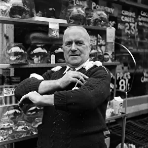 Cecil Crighton, who owns the oldest pet shop in Belfast, Northern Ireland