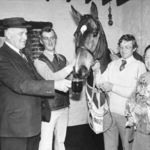 Celebrations for racehorse Grittar after victory in the 1982 Grand National race