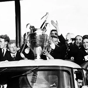 The Celtic football team parade the European Cup trophy from an open top lorry during