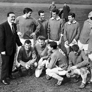 Celtic manager Jock Stein jokes with players during a break from training
