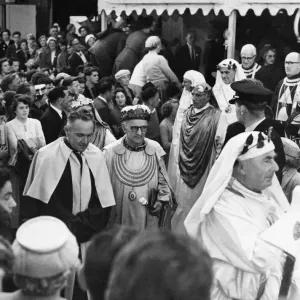 The chaired bard, T Llew Jones of Llandysul, leaves the pavilion The chaired bard, T Llew Jones of Llandysul, leaves the pavilion