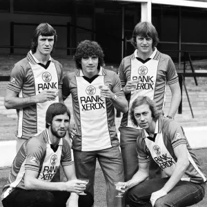 A champagne toast for Southampton FC players wearing their new Rank Xerox sponsored A champagne toast for Southampton FC players wearing their new Rank Xerox sponsored